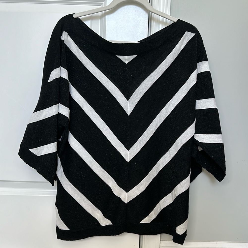 White House black market top.  Just enough subtle sparkle:)